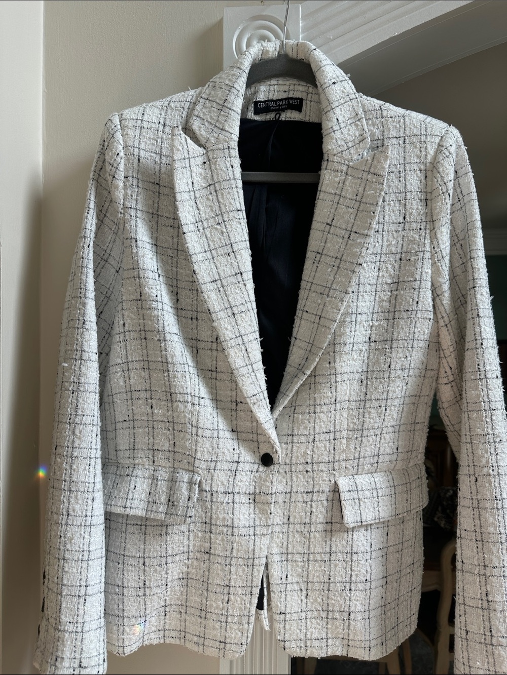 Central Park West women’s tweed blazer. Fully lined. Single snap closure.